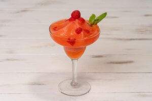 Frozen strawberry daiquiri served in a chilled glass
