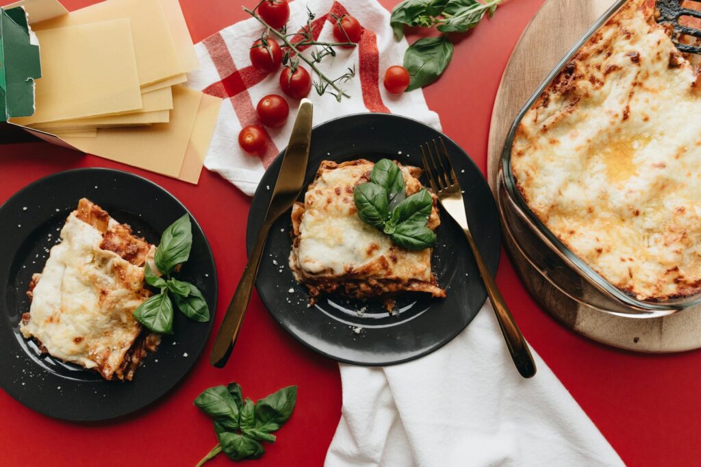 Authentic beef lasagna with layers of pasta, Bolognese, béchamel, and melty cheese