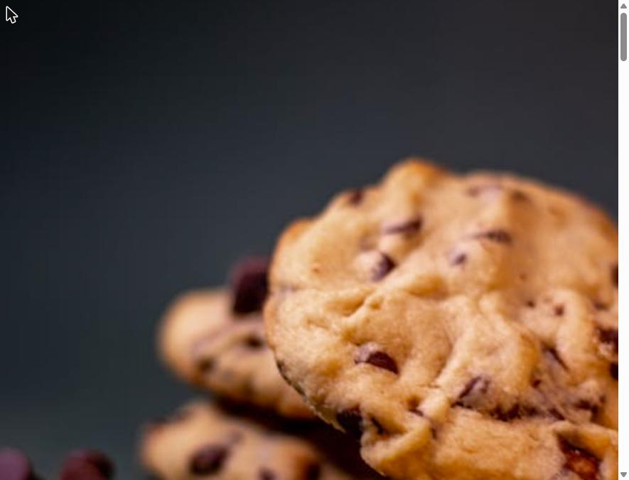 Close-up of golden classic chocolate chip cookies with melted chocolate chips
